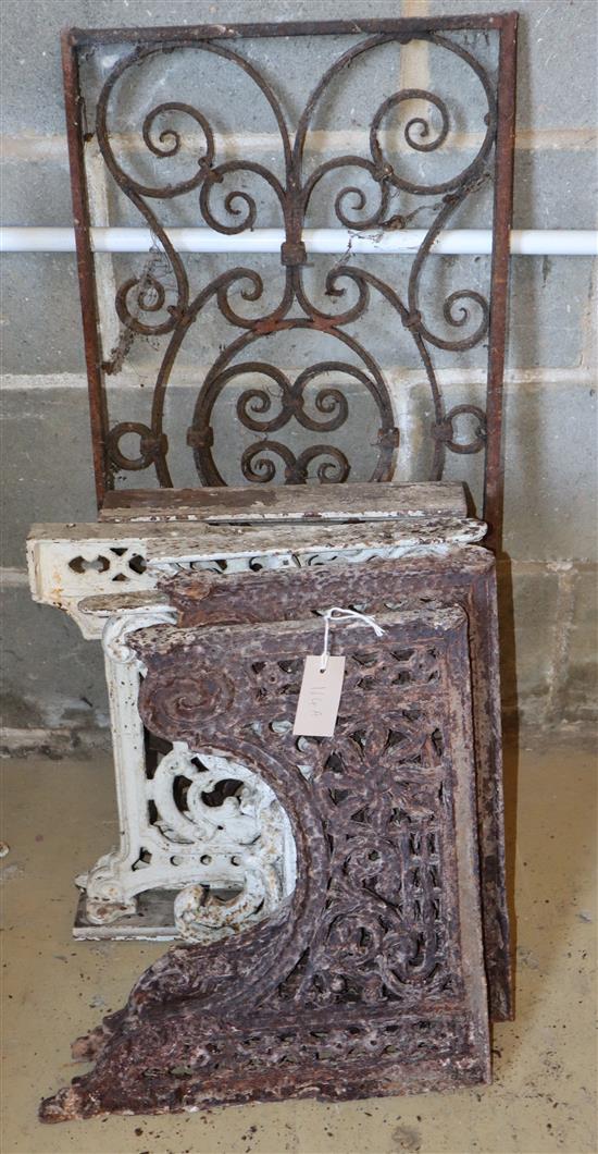 Six cast iron bench supports and brackets and wrought iron panel, largest width 37.5cm, height 80cm